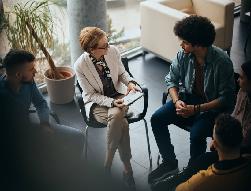 above-view-of-counseling-during-group-therapy-at-m-2023-02-02-20-29-06-utc